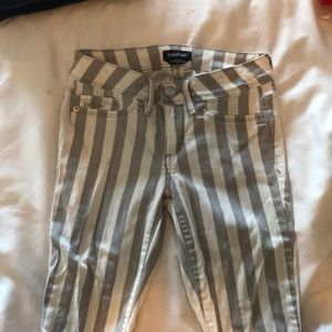 Bebe size 25 striped grey and white skinny jeans